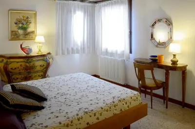 Letto o letti in una camera di Casa Fondamente Nuove