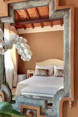 Letto o letti in una camera di Ca' Riza