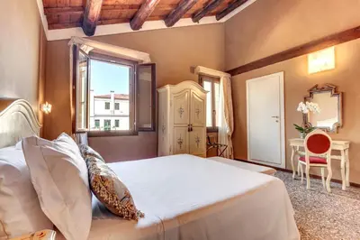Letto o letti in una camera di Ca' Riza