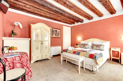 Letto o letti in una camera di Ca' Riza