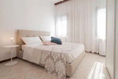 Letto o letti in una camera di Riva Excelsior Apartment