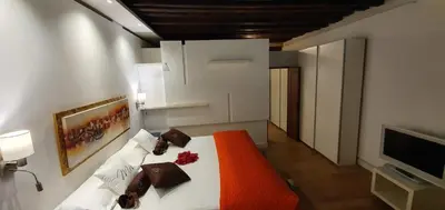 Letto o letti in una camera di WellVenice Grand Canal