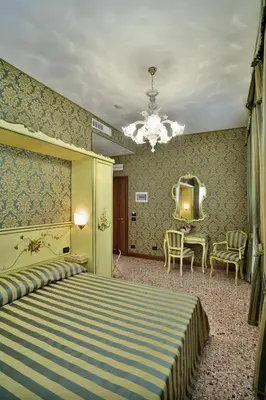 Letto o letti in una camera di Hotel Al Malcanton