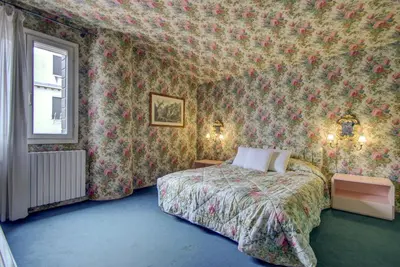 Letto o letti in una camera di ARNOLDI-Rooftop