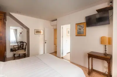 Letto o letti in una camera di Campiello Zen B&B