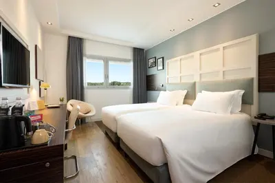 Letto o letti in una camera di voco Venice Mestre - The Quid by IHG