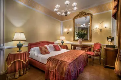Letto o letti in una camera di Villa Margherita