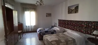 Letto o letti in una camera di Ve-nice Suite Formosa C5141