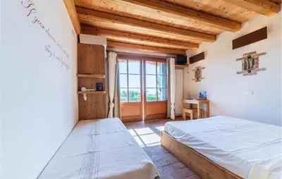 Letto o letti in una camera di Vista Dai Colli
