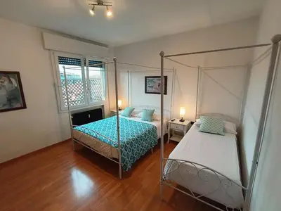Letto o letti in una camera di Nino Bixio TREVISO WIFI