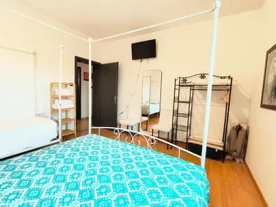 Letto o letti in una camera di Nino Bixio TREVISO WIFI