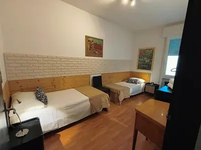 Letto o letti in una camera di Nino Bixio TREVISO WIFI