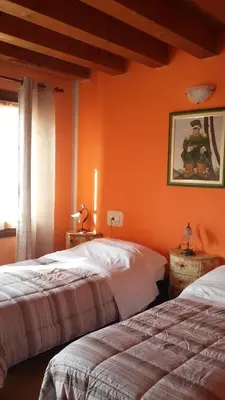 Letto o letti in una camera di Alloggi Alba