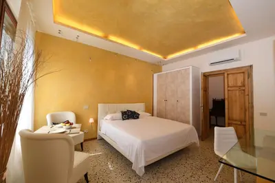 Letto o letti in una camera di Amor Mio B&B