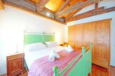 Letto o letti in una camera di Ponte dei Greci WIFI 162