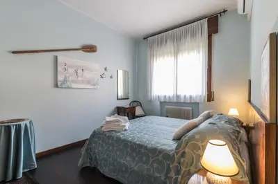 Letto o letti in una camera di Casa Bibi