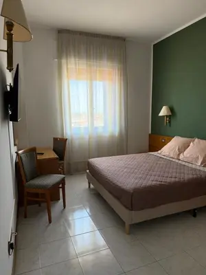 Letto o letti in una camera di Hotel Florida