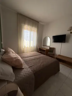 Letto o letti in una camera di Hotel Florida