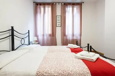 Letto o letti in una camera di Ca' Del Mercato by Sarlux