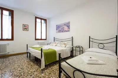 Letto o letti in una camera di Ca' Del Mercato by Sarlux