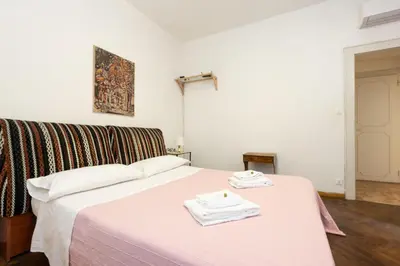 Letto o letti in una camera di Ca' Del Mercato by Sarlux