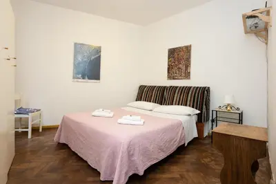 Letto o letti in una camera di Ca' Del Mercato by Sarlux