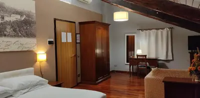 Letto o letti in una camera di Locanda degli Ulivi