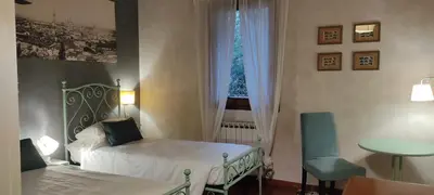 Letto o letti in una camera di Locanda degli Ulivi