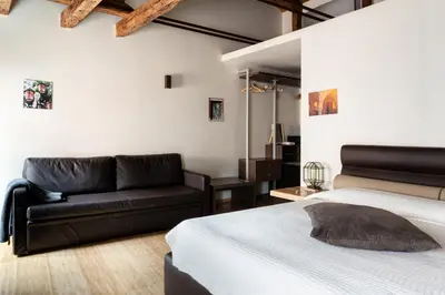 Letto o letti in una camera di B&B Casin dei Nobili