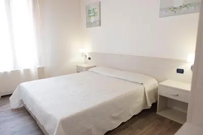 Letto o letti in una camera di Residence Eremitani