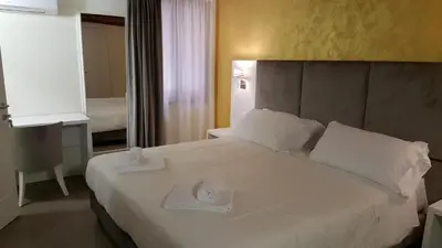 Letto o letti in una camera di Maison d'Elite Guest House