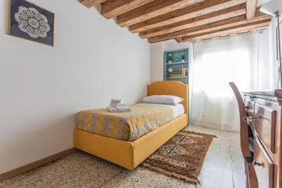 Letto o letti in una camera di Ca' Roberta
