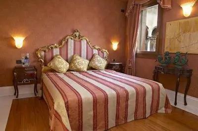 Letto o letti in una camera di Ca' Gottardi