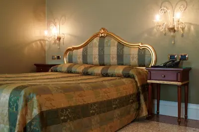 Letto o letti in una camera di Ca' Gottardi