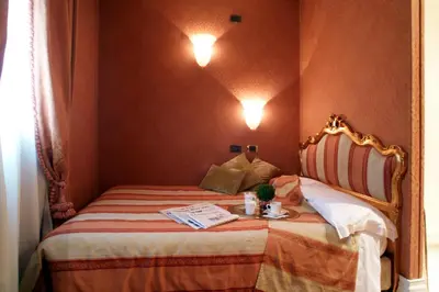 Letto o letti in una camera di Ca' Gottardi