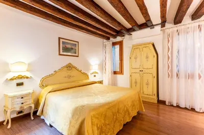 Letto o letti in una camera di Ca' Pinelli