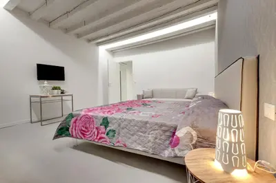 Letto o letti in una camera di Bacchus Venice Residence by Wonderful Italy