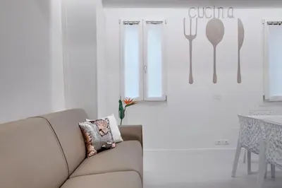 Area soggiorno di Bacchus Venice Residence by Wonderful Italy