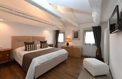 Letto o letti in una camera di Sweet Apartment Frari