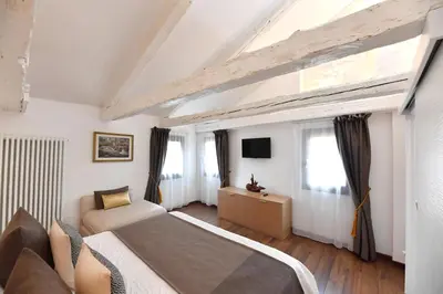 Letto o letti in una camera di Sweet Apartment Frari