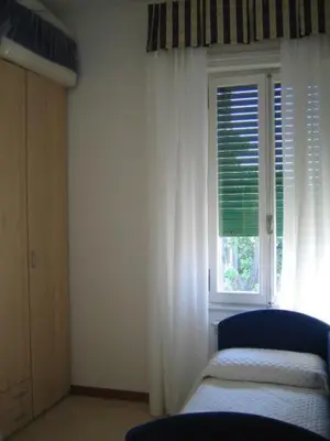 Letto o letti in una camera di Villa Gabriella B&B - Apartments