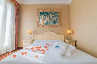 Letto o letti in una camera di Hotel Terme Roma