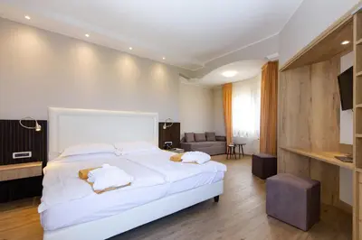 Letto o letti in una camera di Hotel Terme Leonardo