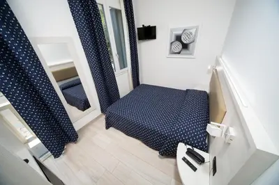 Letto o letti in una camera di Hotel Giotto