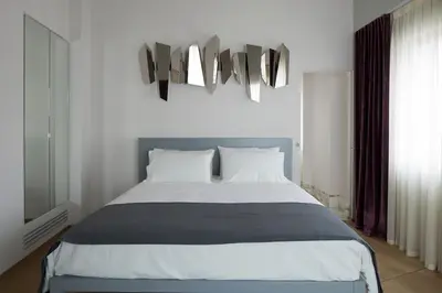 Letto o letti in una camera di Ai Bastioni Boutique Hotel