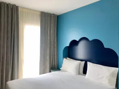 Letto o letti in una camera di Ai Bastioni Boutique Hotel