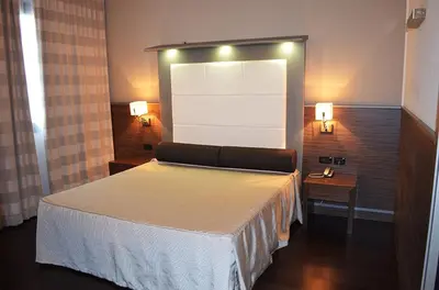 Letto o letti in una camera di Hotel Ristorante Giada