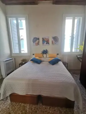 Letto o letti in una camera di CA FOSCARINI 1