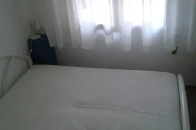 Letto o letti in una camera di Appartamento Centromare solo famiglie