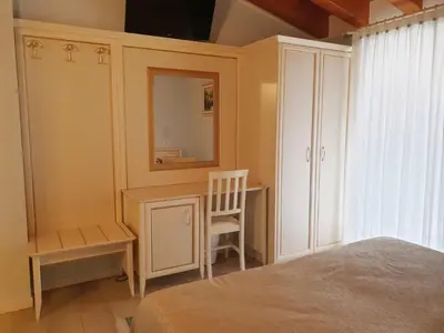 Letto o letti in una camera di Villa Serena Agriturismo
